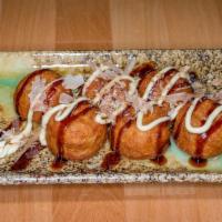 Takoyaki  (6Pcs) · Fried Octopus And Vegetable Dumpling With Japanese Mayo, House Special Sauce And Bonito Flak...