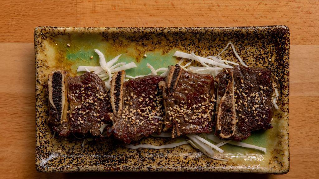 Beef Short Ribs /  牛バラ肉  (4Pcs) · Fried Japanese Style Marinated Beef Short Ribs With Sesame Seeds.