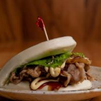 Beef Bun /   牛肉まん · Steamed Bun With Sliced Beef & Onion Simmered In Chef Special Sauce.
