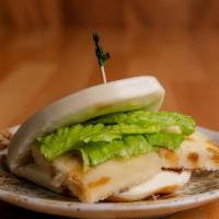 Tofu Bun · Steamed Bun Wrapped Lettuce, Deep Fried Tofu With Japanese Mayo And House Special Sauce.