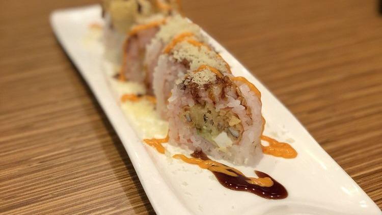Crunchy Spider · Spicy. Inside: spicy soft shell. Top: spicy tuna, spicy crab, tempura flakes, and eel sauce.