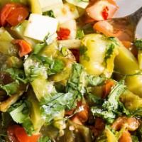 Portugese Salad · Roasted bell peppers and tomatoes, cucumbers, cilantro tossed in red wine vinaigrette.