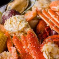 Family Platter · Comes with (4) corn, (4) potatoes, & (4) eggs. 1 lb. Snow crab legs, 1 lb. Lobster tails, 1 ...