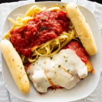 Chicken Parmesan With Fettuccine Marinara Sauce · Chicken Parmesan Served with Small Portion of Fettuccine with Marinara Sauce