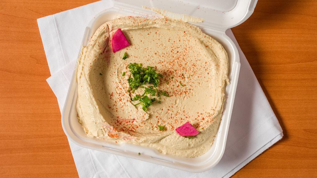 Hummus · Vegetarian. Mashed chickpeas with sesame seed sauce.