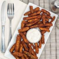 Salt & Pepper Pickle Fries · Thinly sliced dill pickle strips breaded in salt and pepper batter then fried to perfection,...