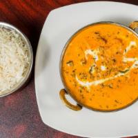 Palak Paneer · Fresh creamed spinach cooked with homemade cottage cheese and traditional spices. Served wit...