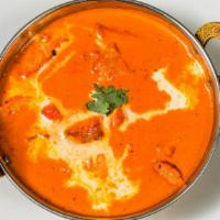 Chicken Makhani(Butter Chicken) · A blend of yogurt, spices marinated chicken meat shredded and dressed in a velvety red bath ...