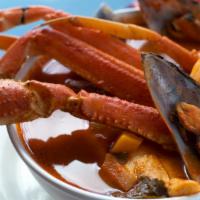 Caldo De Mariscos · Soup with shrimp, tilapia, octopus, mussels, snow crab and vegetables.
