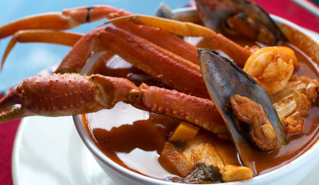 Caldo De Mariscos · Soup with shrimp, tilapia, octopus, mussels, snow crab and vegetables.