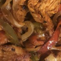 Chicken Fajitas · Served with sauted onions, bell peppers. lettuce, cheese, pico, rice and beans on the side.