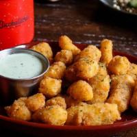 Buckatabon Curd 1/2# · Local Decatur Dairy Muenster cheese curds, breaded and fried. Served with herbed ranch