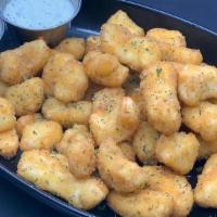 Buckatabon Curd 1# · Local Decatur Dairy Muenster cheese curds, breaded and fried. Served with herbed ranch