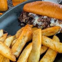Signature Prime Rib Sandwich · Slow-roasted, herb-rubbed Prime rib*, herbed mushrooms, aged white cheddar, caramelized onio...