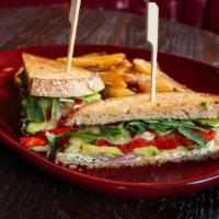 Cheese & Veggy Sammy · Herb cheese, roasted peppers, red onion, avocado, spicy cucumber salad, and arugula on toast...