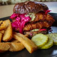 Cajun-Fried Lake Perch · Creole-seasoned, beer battered lake perch,. red cabbage slaw, creole remoulade, and pickles ...