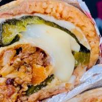 Burrito Chile Relleno · Huge burrito stuffed with a chile relleno. Grilled steak, rice, beans topped with a ranchera...
