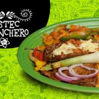 Bistec Ranchero · Tender rib-eye steak grilled with onions, tomatoes, bell peppers and a banana pepper filled ...