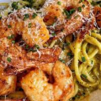 Roasted Poblano Pasta · Grilled shrimp or chicken sautéed in a buttery sauce, garnished with roasted poblano pepper ...