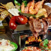 Parrillada Mexicana · Grilled chicken, steak, shrimp, chorizo (Mexican sausage) and pork serve with two sides of r...