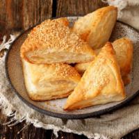 Pastelillos Con Carne · Delicious picadillo (ground beef hash) turnovers, fried to golden perfection.