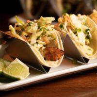 Fish Tacos · 3 Corn Tortillas with Fried Cod, Ranch Verde, Cilantro, Onions, Shredded Cabbage & Pico de G...