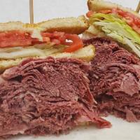 Triple Decker Dinty Moore · Our famous Corned Beef, lettuce, tomato, Russian Dressing served on 3 slices of white toast
...