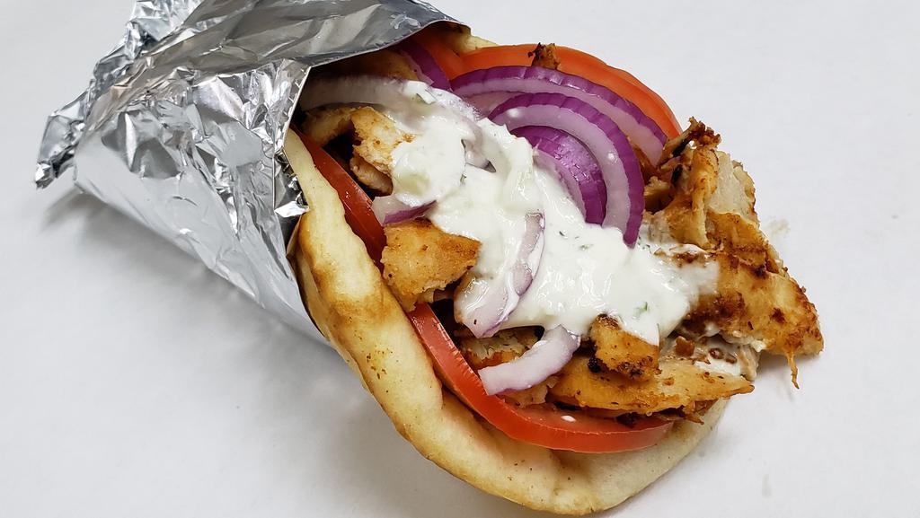 Chicken Gyros · Thinly sliced and marinated grilled chicken breast, sliced onion and tomato topped with our homemade Tzatziki (cucumber) sauce.