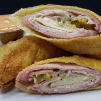 The Bambino Egg Roll · Seasoned turkey breast, Amish ham, melted cheese, banana peppers blended with our italian se...