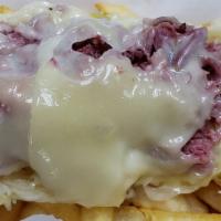 Reuben French Fries · French fries topped with our award winning Corned Beef, sauerkraut and melted Swiss cheese.