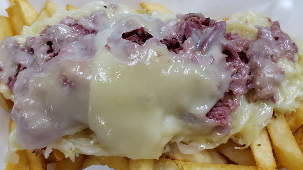 Reuben French Fries · French fries topped with our award winning Corned Beef, sauerkraut and melted Swiss cheese.