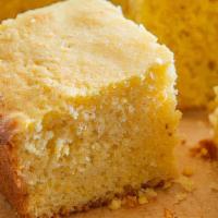 Sweet Corn Bread · A slice of our soft, fluffy sweet corn bread.