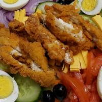 Chicken Strip Salad · Crisp lettuce topped with tender chicken strips, American cheese, tomato, olives with ranch ...