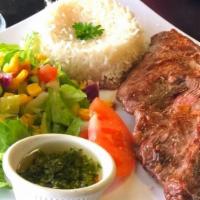 Bottom Sirloin / Fraldinha · 8oz bottom sirloin, grilled served with white rice and our homemade chimichurri sauce