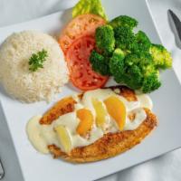 Blackned Tilapia / Tilapia Temperada · Fresh tilapia generously dipped in our homemade lemon-butter sauce  and coated in our famous...