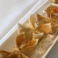 Crab Rangoon (8 Pcs.) · Crispy wontons filled with crab meat in a Cream cheese base served sweet and sour sauce.