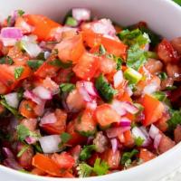 Pico De Gallo · Mexican salsa made from chopped tomatoes, onions and jalapeños. Chips included.
