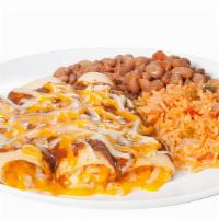 Combo Enchilada Plate · (3) rolled corn tortillas stuffed with your choice of filling, smothered in a mild enchilada...