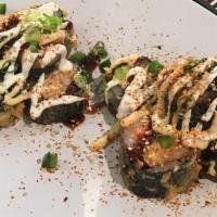 Carnival Roll · Spicy hot mess mix, cream cheese, jalapeno, bell pepper, tempura fried topped with spicy may...