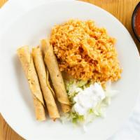 Chicken Flautas · Crunchy deep fried rolled tacos.
