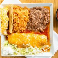 Limp Plato · 1 pork or chicken burrito spread 
1 beef or chicken taco 
1 chicken flauta 
With rice or beans