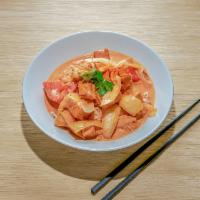 Massaman Curry · Spicy massaman curry with coconut milk potatoes, tomatoes, onions and peanuts. Spicy.