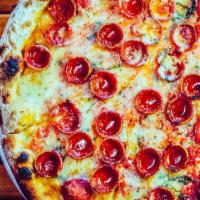 Pepperoni Pizza · Our house-cut pepperoni make this pie stand out.