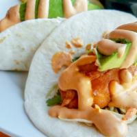 Fish Tacos · Three soft flour tortillas stuffed with fried haddock Mexican slaw, avocado slices, chipotle...