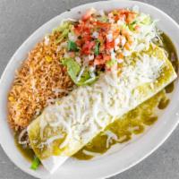 Burrito Carne Asada · Our savory carne asada rolled up with onions, peppers and beans. Topped with cheese sauce an...
