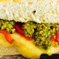 Chicken Pesto · Grilled chicken breast, mozzarella cheese, sweet roasted red peppers, and our special pesto ...