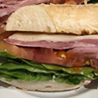 Italian · Mortadella, salami, provolone cheese, sweet roasted red peppers, lettuce, tomato, and vinaig...