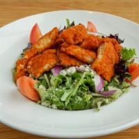 Buffalo Chicken Salad · Crispy buffalo chicken, romaine, tomatoes, red onions, celery, pepperoncini peppers, bleu ch...