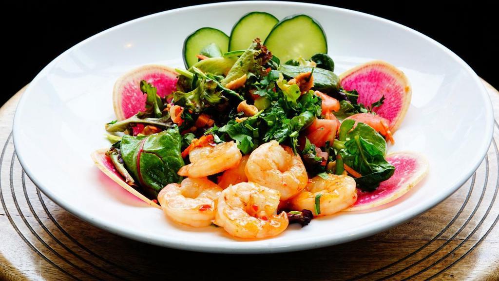 Thai Shrimp Salad · Grilled sweet Thai chili shrimp, pickled carrot, tomato, watermelon radish, mint, cucumber, peanuts, cilantro, hoisin vinaigrette