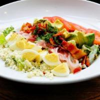 Chopped Salad · Romaine, bacon, hard-boiled egg, pickled shallot, tomatoes, avocado, bleu cheese crumbles, b...